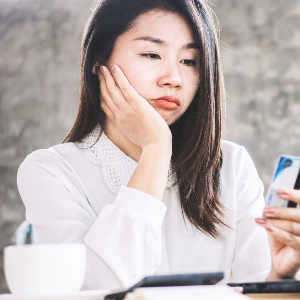 An unhappy young lady who didn't plan her spending well.