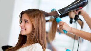 A woman enjoying her Hair Spa Session.