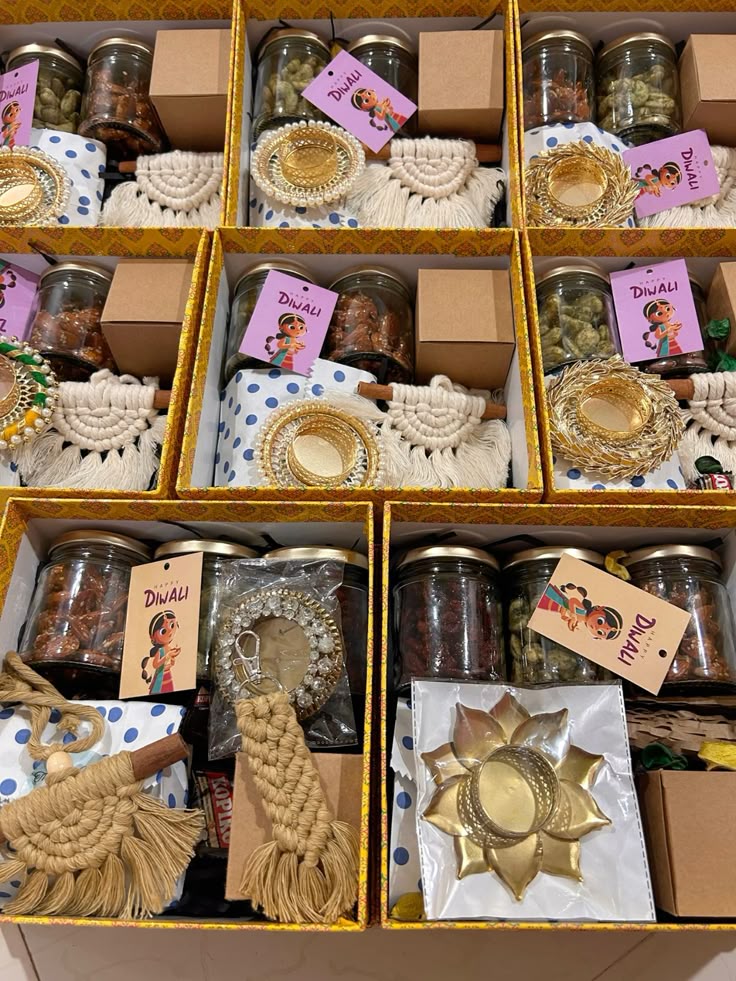 A high-angle shot captures six festive gift boxes arranged in three rows of two, presented against a light-colored surface.